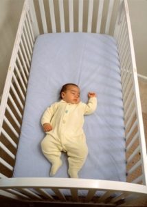 Baby in Open Crib